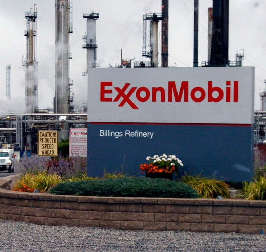 exxonmobil billings refinery entrance with smoke stacks in the background