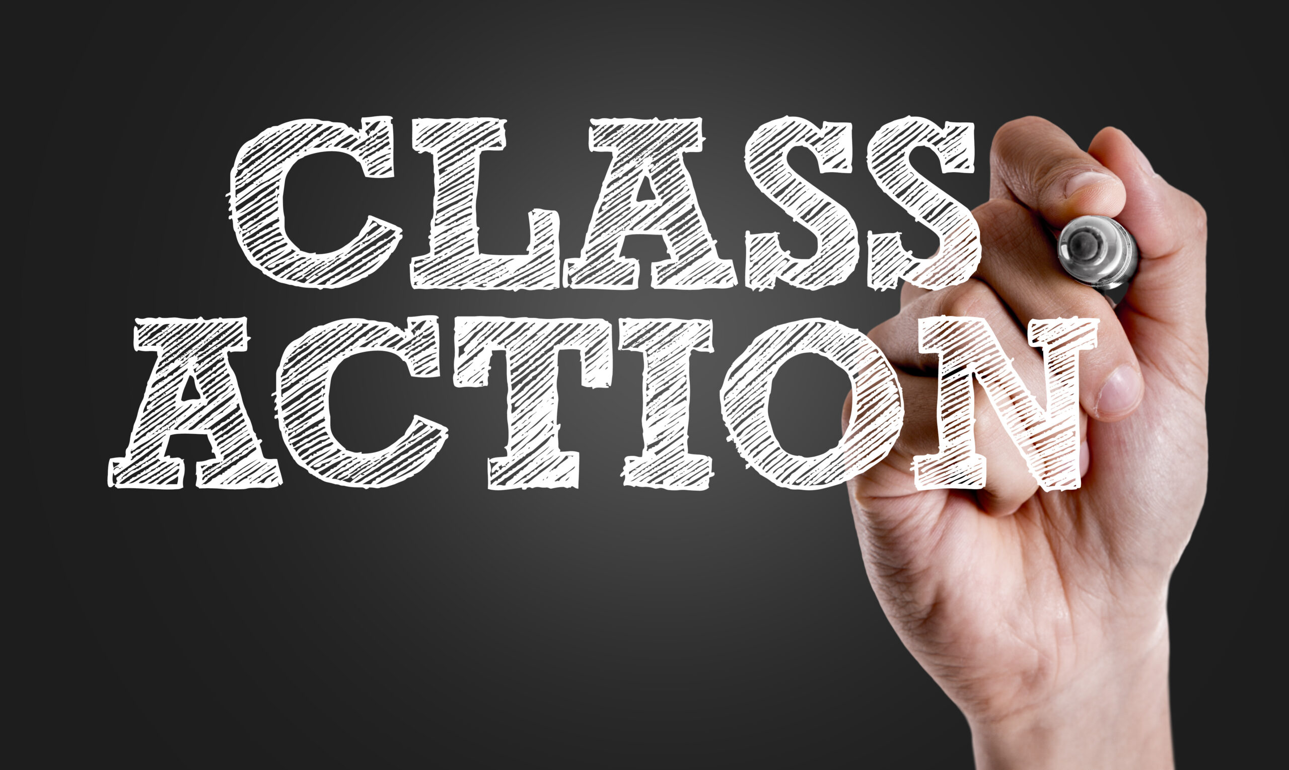 Hand writing the text: Class Action