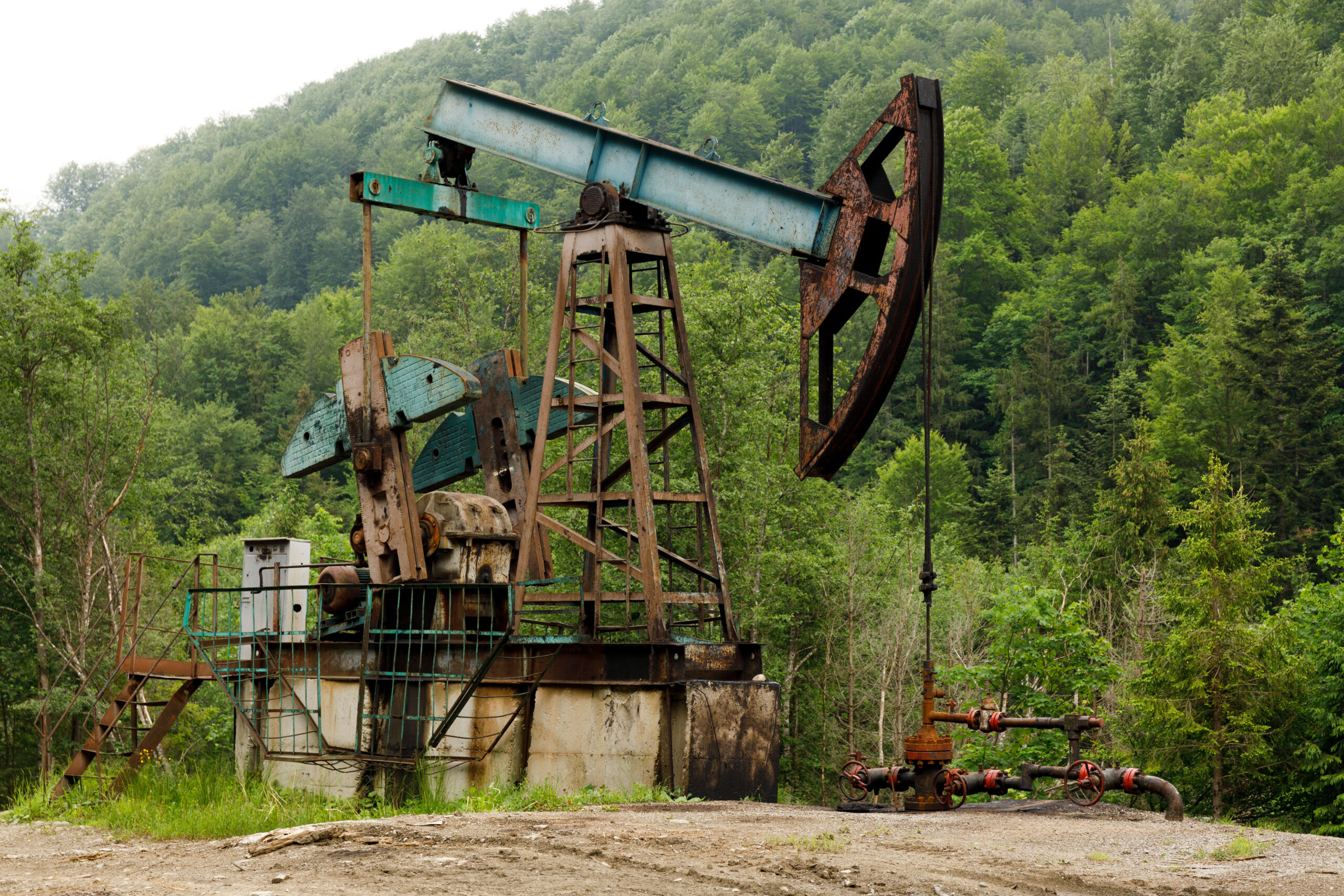 Old oil well, illegal oil extraction.