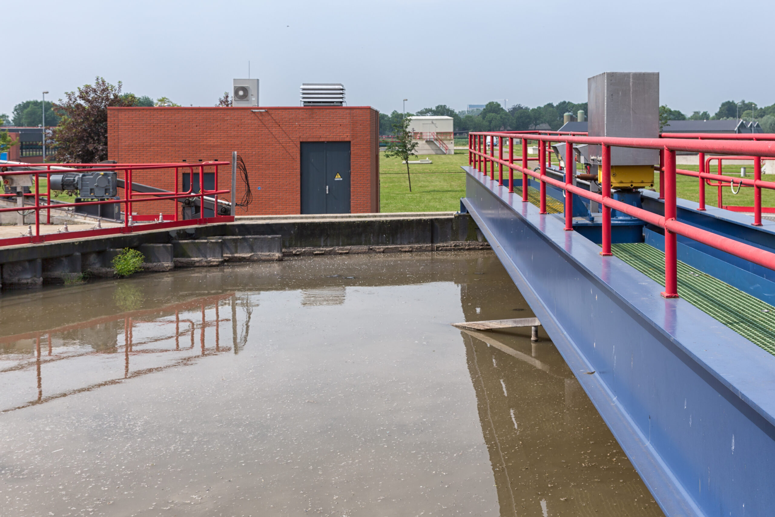 Dirty water in sedimentation tank of sewage treatment plant. In the first sedimentation tank is the primary clarification of the wastewater treatment process